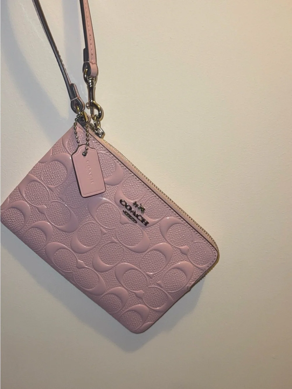 COACH Pink Signature Embossed Leather Wristlet